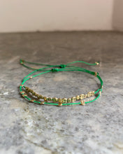 Charger l'image dans la galerie, Bracelet Pépites dorée noeud coulissant