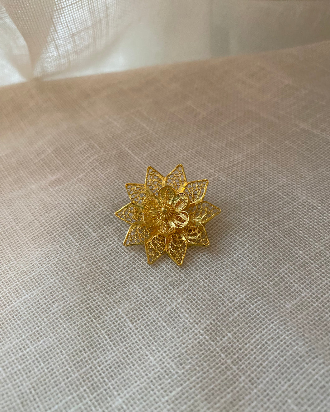 Vintage snowflake brooch